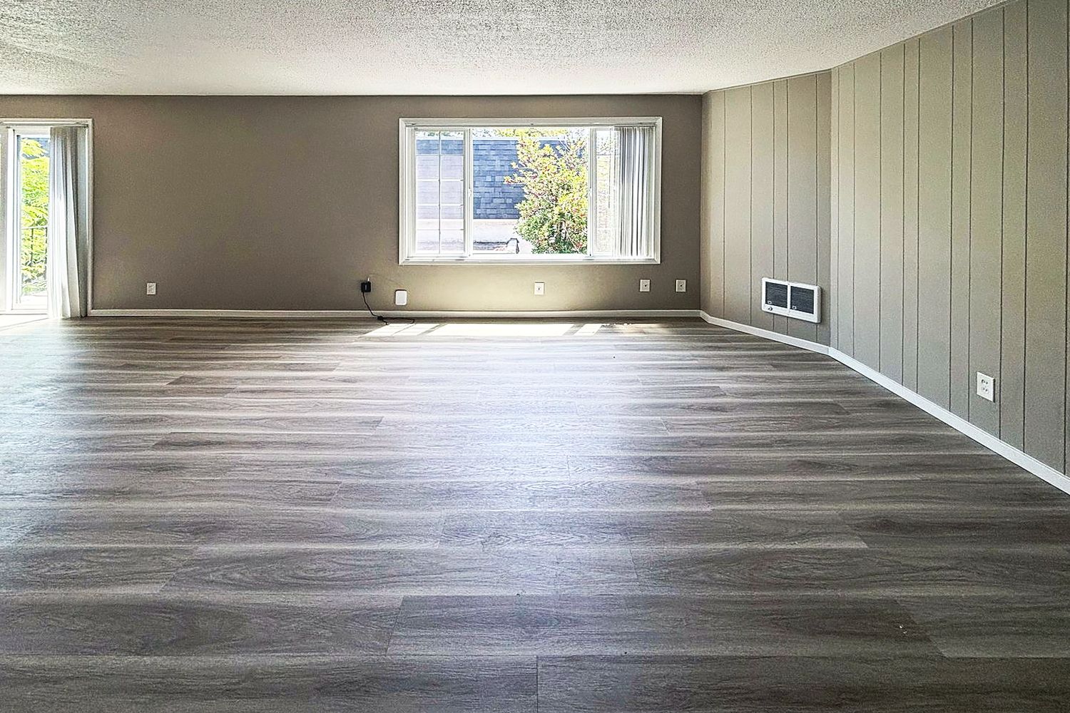Living room with a large front window